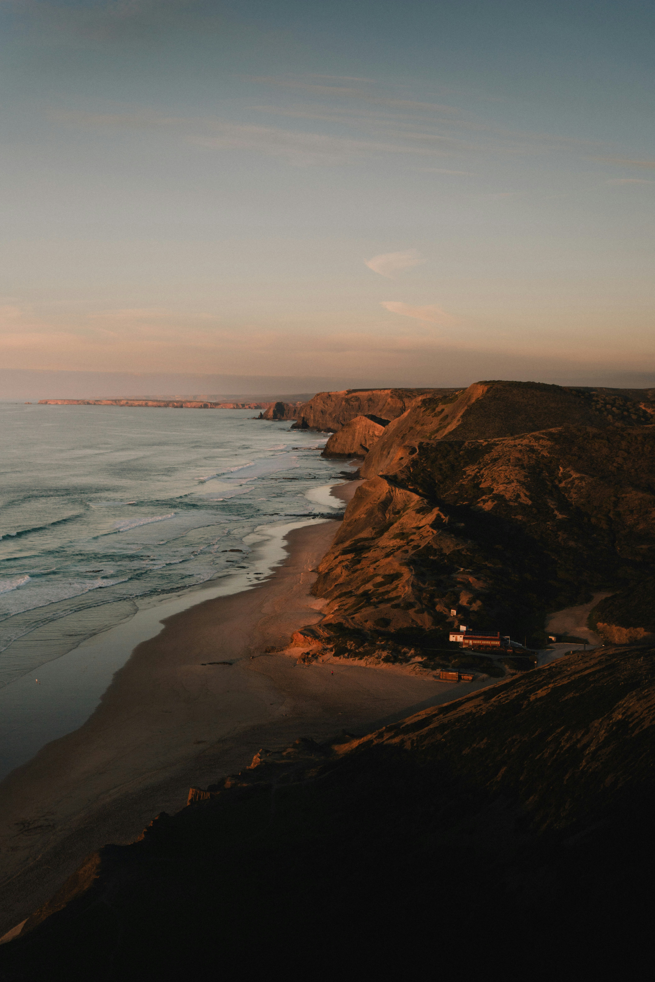 Cordoama beach and dramatic cliffs at sunset, Western Algarve